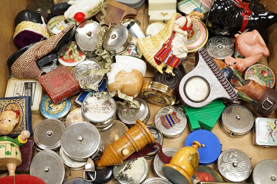 A collection of late 19th and 20th century novelty / souvenir sewing related tape measures